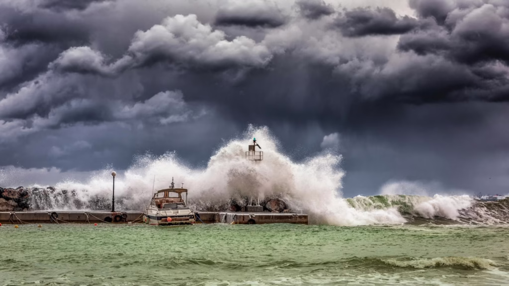 The Viral "Hurricane Humberto Cat 5 Threat to Florida" Panic That's Sparking Evacuation Fears—Busted! 2 big waves under cloudy sky